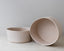 Two Trend{ING} Bianca stone bowls in shale colour