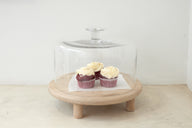 Trend{ING}s Glass Cake Dome on Oak Wooden Stand with red velvet cupcakes inside