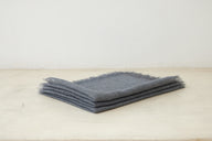 Trend{ING}s Linen Challah/Bread Cover in charcoal; folded on top of each other