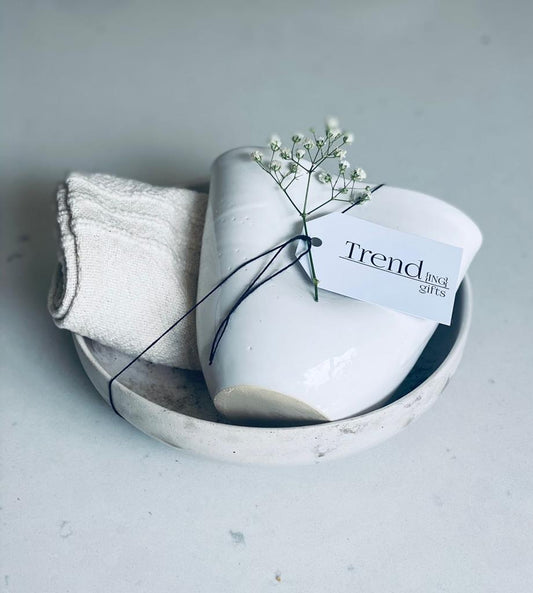 The Clean Slate Ritual Gift Box, featuring a Ceramic ritual cup, Hand Woven Towel wrapped in a smoky ceramic Cafe Bowl