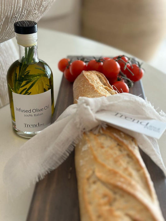 Trend-ings Italian Artisan Sourdough Bread Gift, including sourdough bread with linen challah cover, rosemary infused olive oil and rustic serving board