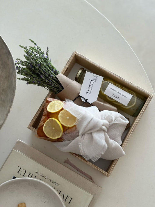 Trend-ings Lavender and Lemons Gift Box, including Recycled wooden storage box  Lemon cake wrapped in a linen challa cover  Home made lemonade  Bunch of fresh Lavender