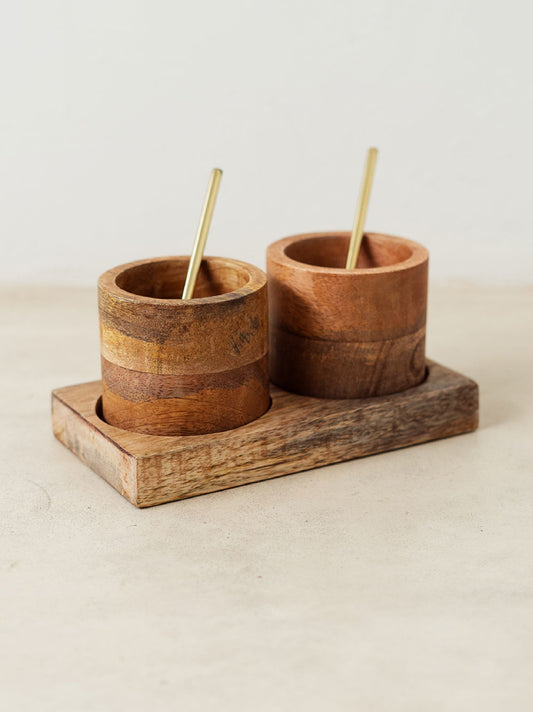 Trend{ING}s wooden barrel spice set filled with a golden teaspoon in each barrel