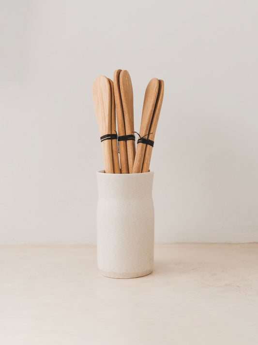 Mixture of Trend{ING}s Ethnic wooden spoons in a jar 