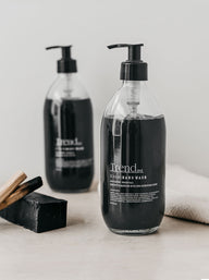 Trend-ings Activated charcoal handwash, two within the picture and palo santo sticks beside them