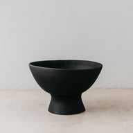 Trend{ING}s Ceramic-Clay-footed bowl in black colour finish; bowl is empty