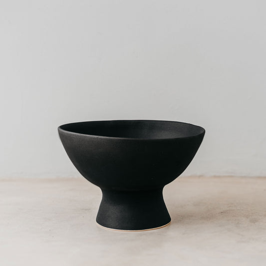 Ceramic clay-footed bowl