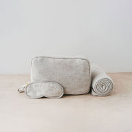 Trend-ings Cotton Travel Bag Kit in linen colour, with a small blanket and eye mask next to it