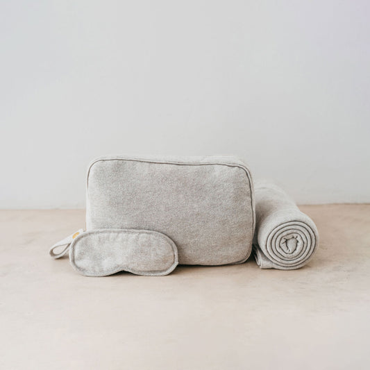 Trend-ings Cotton Travel Bag Kit in linen colour, with a small blanket and eye mask next to it