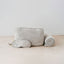 Trend-ings Cotton Travel Bag Kit in linen colour, with a small blanket and eye mask next to it