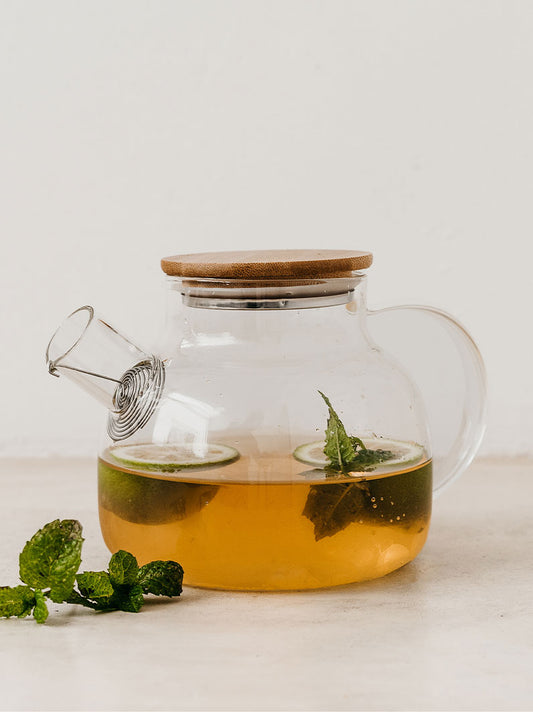 Trend-ings Glass Teapot (800ml) standing with lemon tea and mint leaves inside the teapot