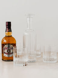 Trend-ings Italian Crystal Whiskey set with decanter and 4 tumblers, and a bottle of Chivas regal next to it