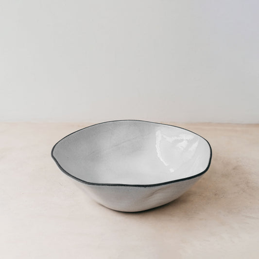 Trend{ING}s Drunken Stone Salad Bowl in Basalt finish; Viewed from the top; empty bowl