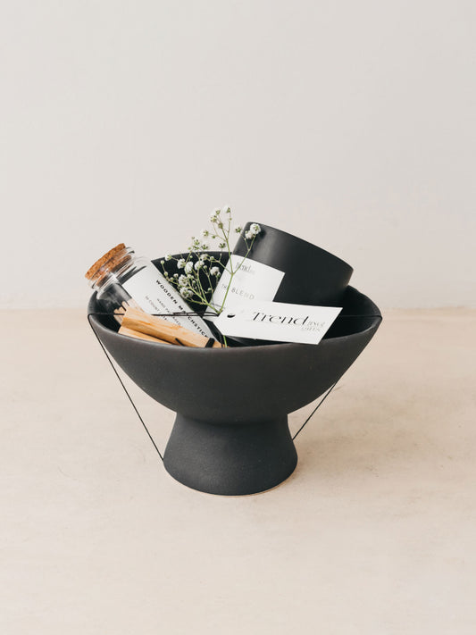 Trend{ING}s Home owners gift of perfection gift box featuring, clay-footed black bowl, luxury long matches with black tips, candle & palo panto sticks